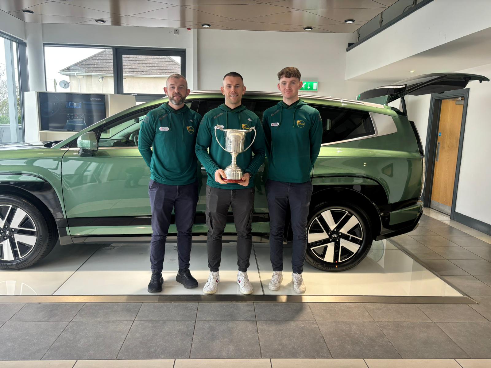 Carlow Footballers visit MLM Carlow with the O'Byrne cup!